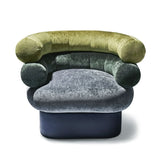 Interlude Home Leona Swivel Chair - Front View on White Background: A front-facing image of the Leona swivel chair, displaying its three-tiered design in green and gray velvet, with cylindrical armrests and a rounded back, set against a clean white background.