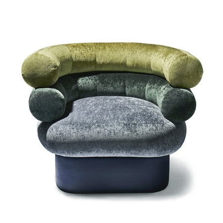 Interlude Home Leona Swivel Chair - Front View on White Background: A front-facing image of the Leona swivel chair, displaying its three-tiered design in green and gray velvet, with cylindrical armrests and a rounded back, set against a clean white background.