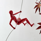 Wall Sculpture Climbing Woman 8"